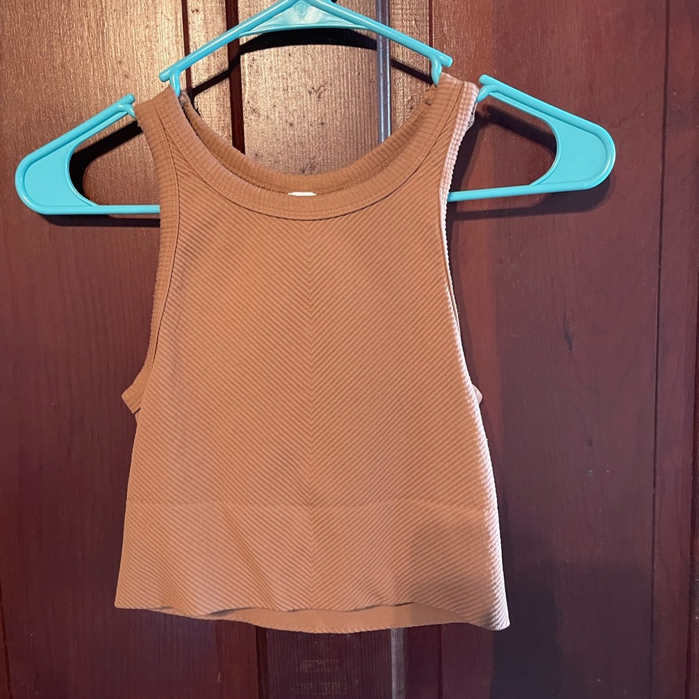 Stretchy burnt orange ribbed crop top. One size.